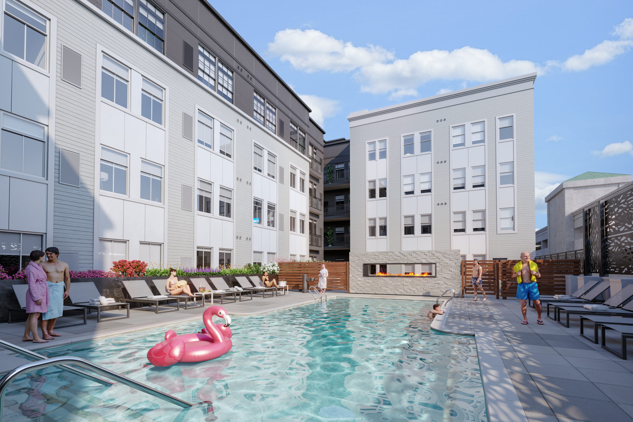 Pool area with lounging chairs and a pink flamingo float surrounded by the apartment building with windows.