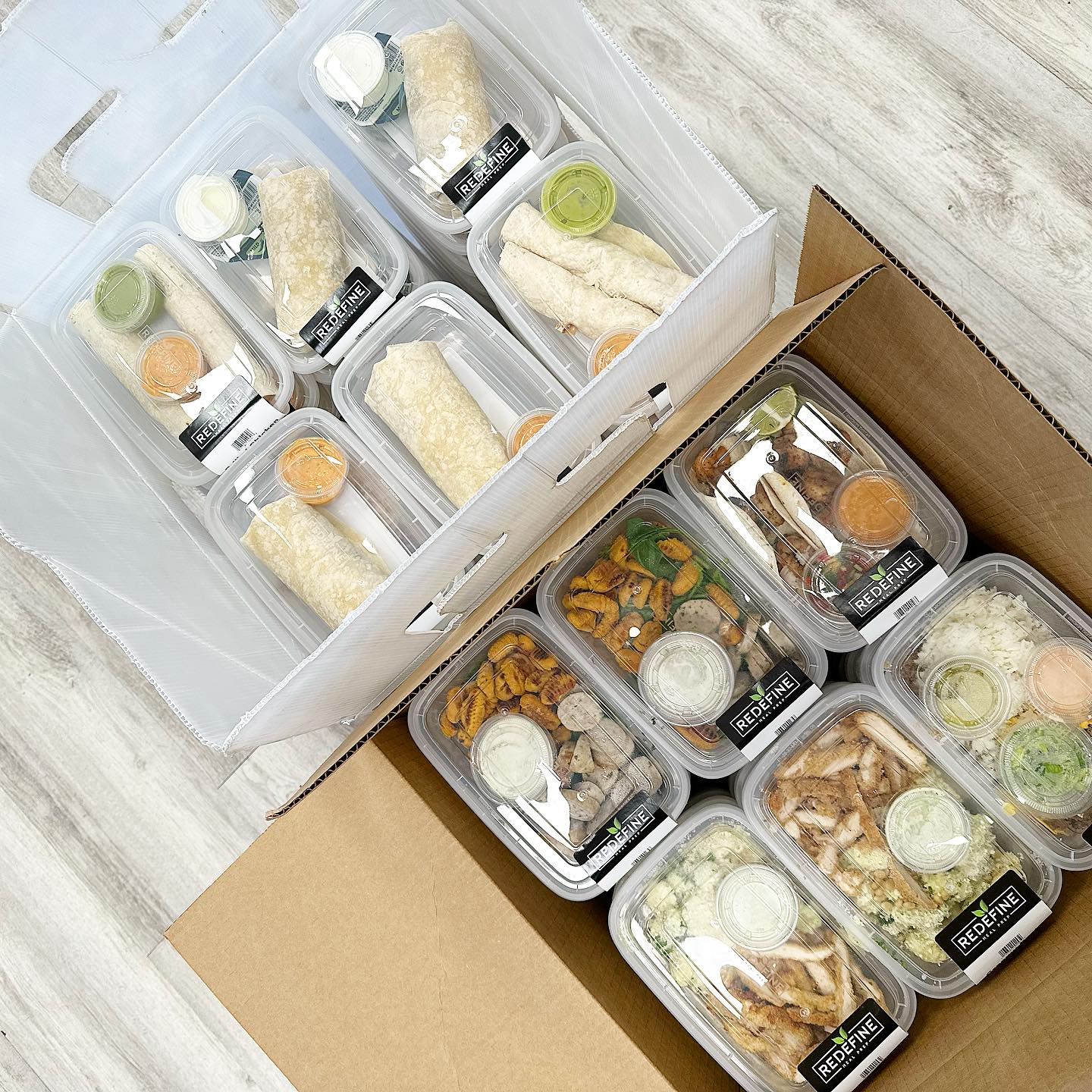 Pre-packaged lunches with the Redefine labels on them.