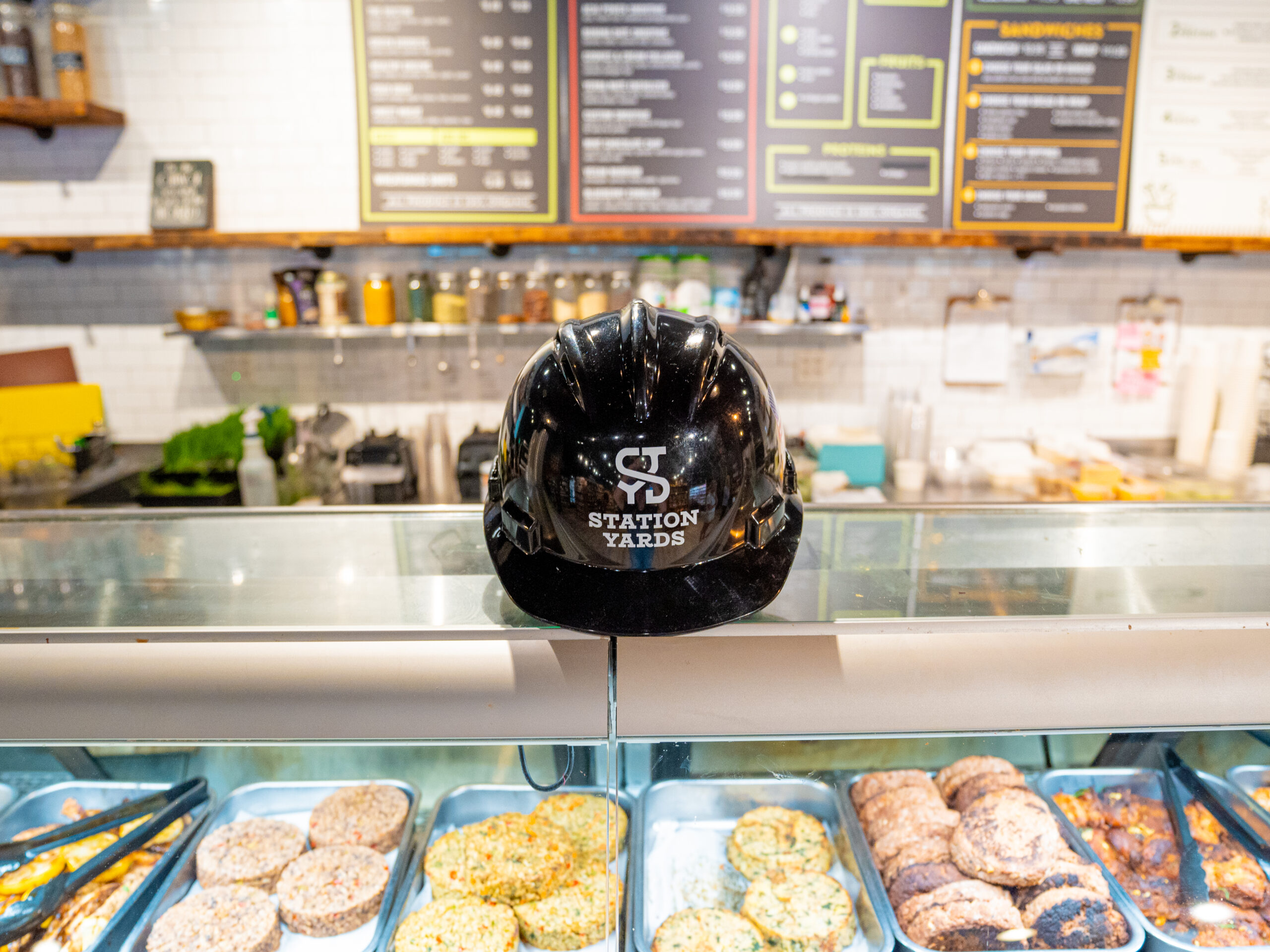 Station Yards hardhat at Cornucopia Natural Foods counter