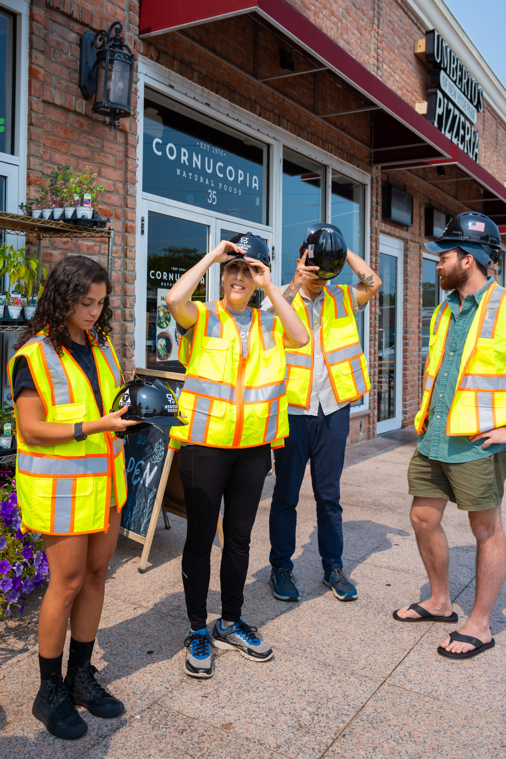 The Cornucopia Natural Foods team putting on Station Yards safety vests