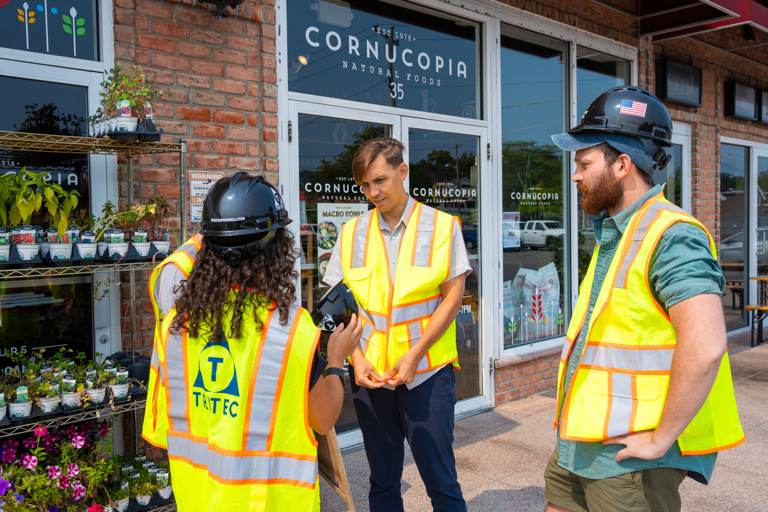 The Cornucopia Natural Foods team putting on Station Yards safety vests