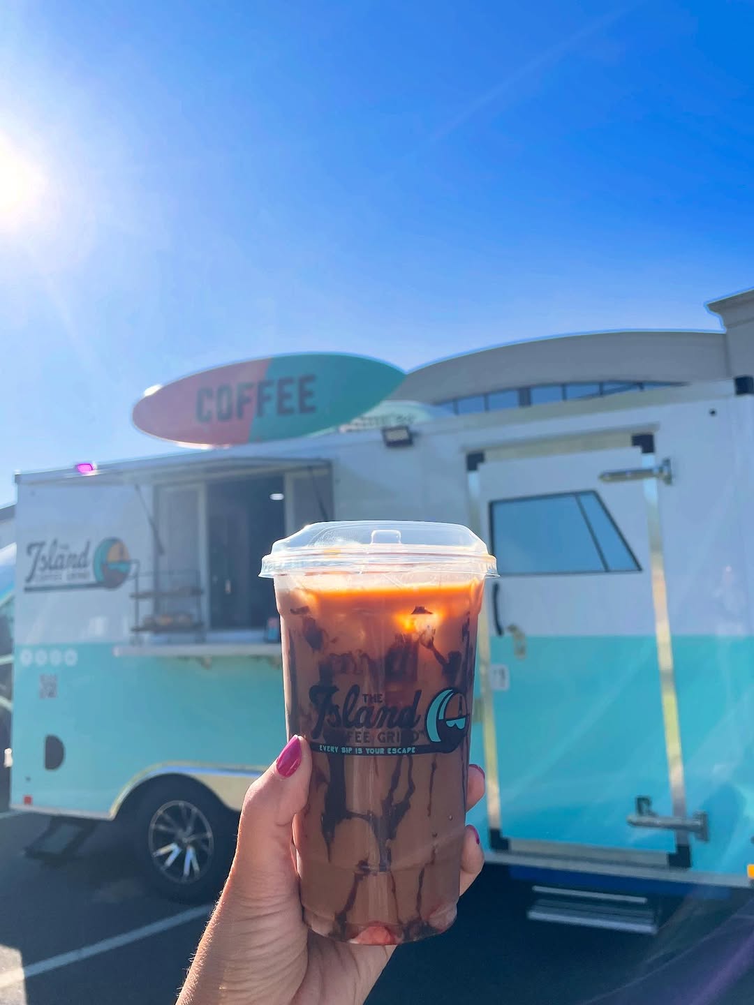 Island Coffee Grind iced coffee in front of the truck