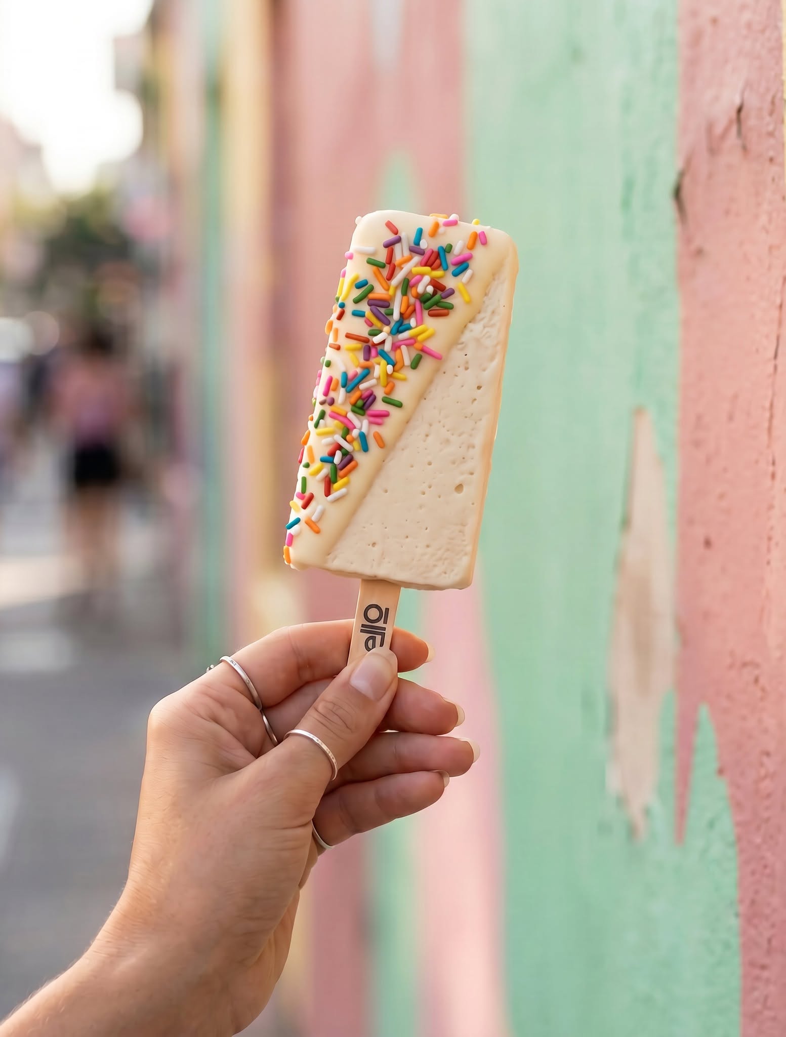 Person holding up a gelato bar