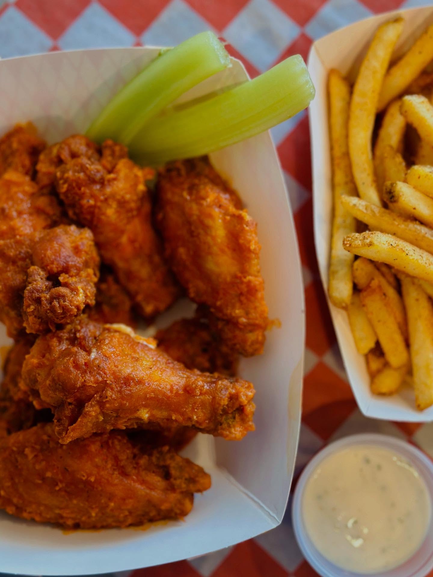 Wings, celery, and a side of fries